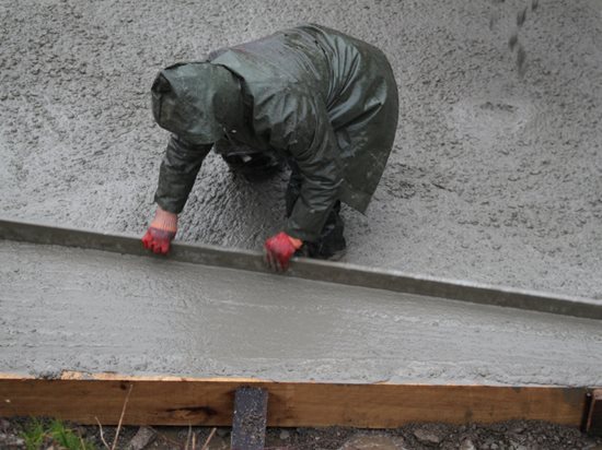 pouring concrete in rain